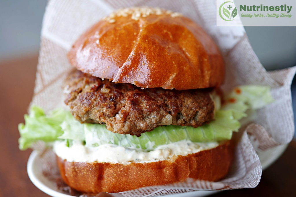 A nutritious hamburger with a whole grain bun, fresh lettuce, tomato, and a lean beef patty.