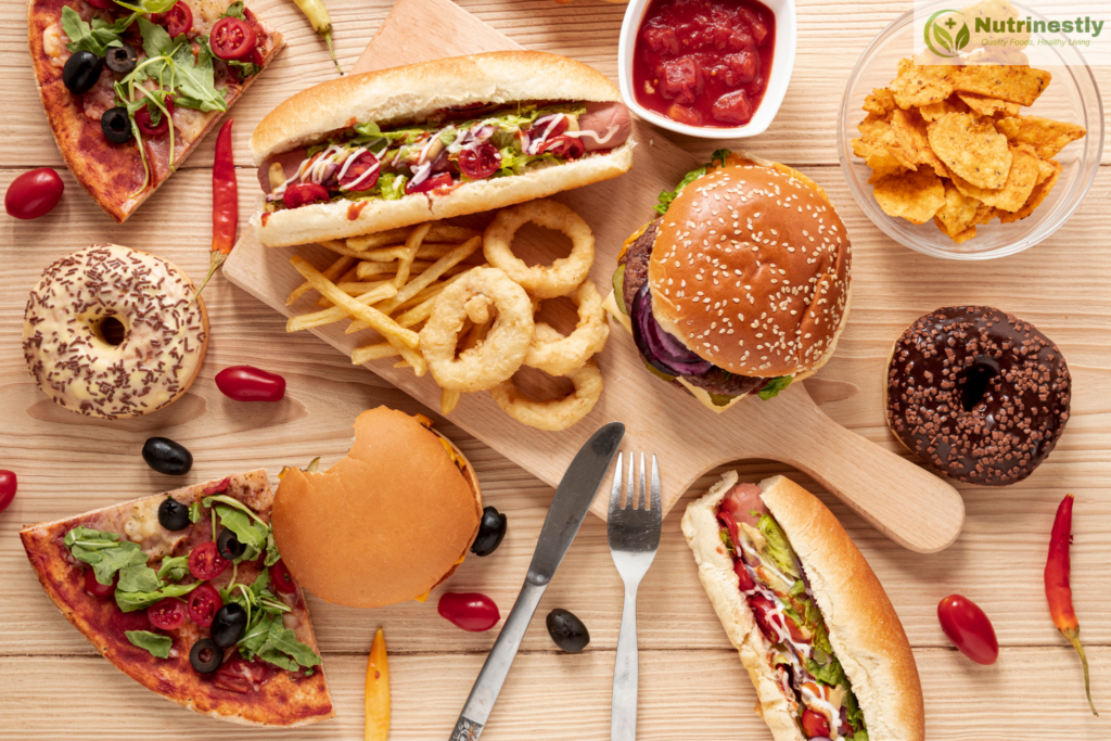 all types of fast food in a wooded table